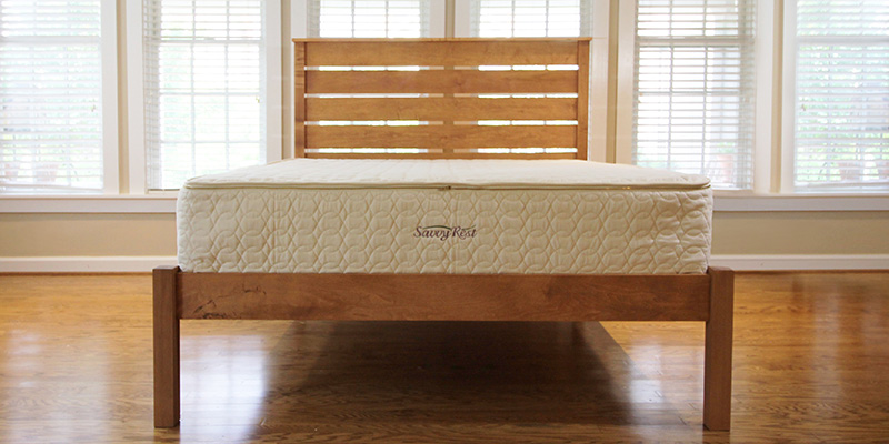 Hybrid mattress with latex and pocketed coils