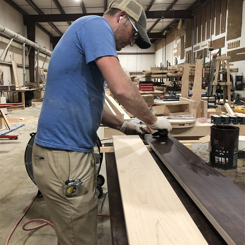 Staining sustainably-sourced maple hardwood.