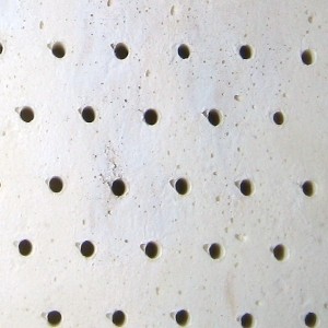 Texture variation. The lighter-colored spots are a bit coarser.