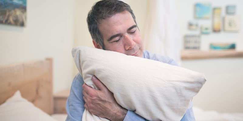 Hugging a Pillow While Sleeping: Psychology, Benefits & More