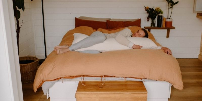 9 Benefits Of Sleeping With A Pillow Between Your Knees