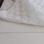 Individually wrapped latex layers in mattress.