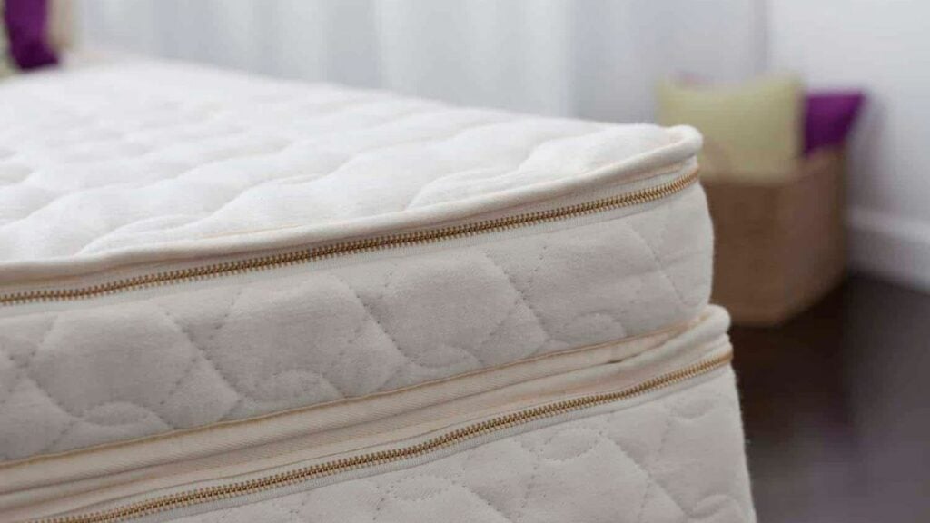 Close-up of a Savvy Rest organic mattress topper