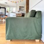 Side view of Verona sofa with organic slipcover in green